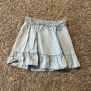 H&M denim skirt.  Flowy so a medium/large can wear